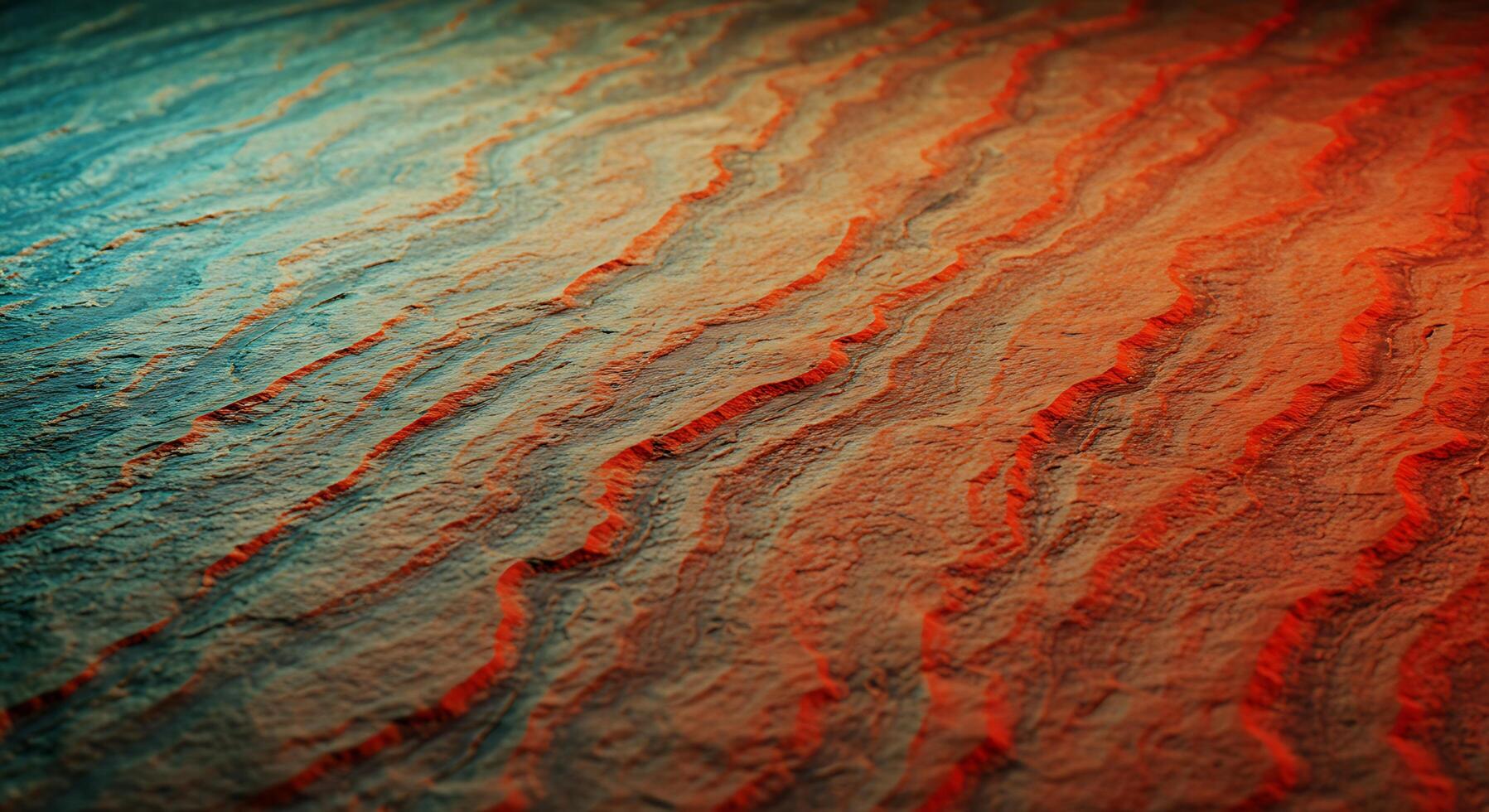 A close up of a sand texture with red and orange colors photo