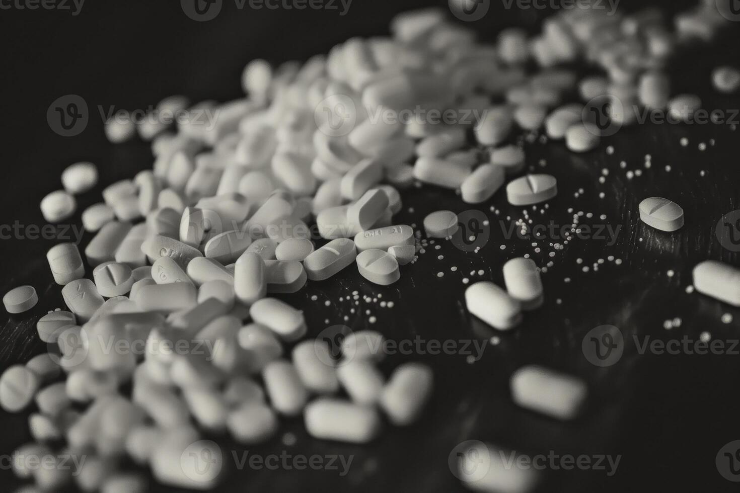 A black and white photo of pills