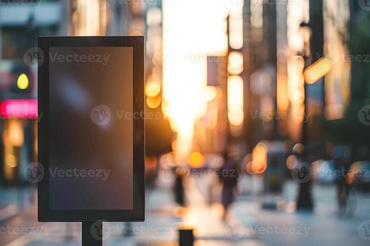 A blank billboard is standing in the middle of a city street photo