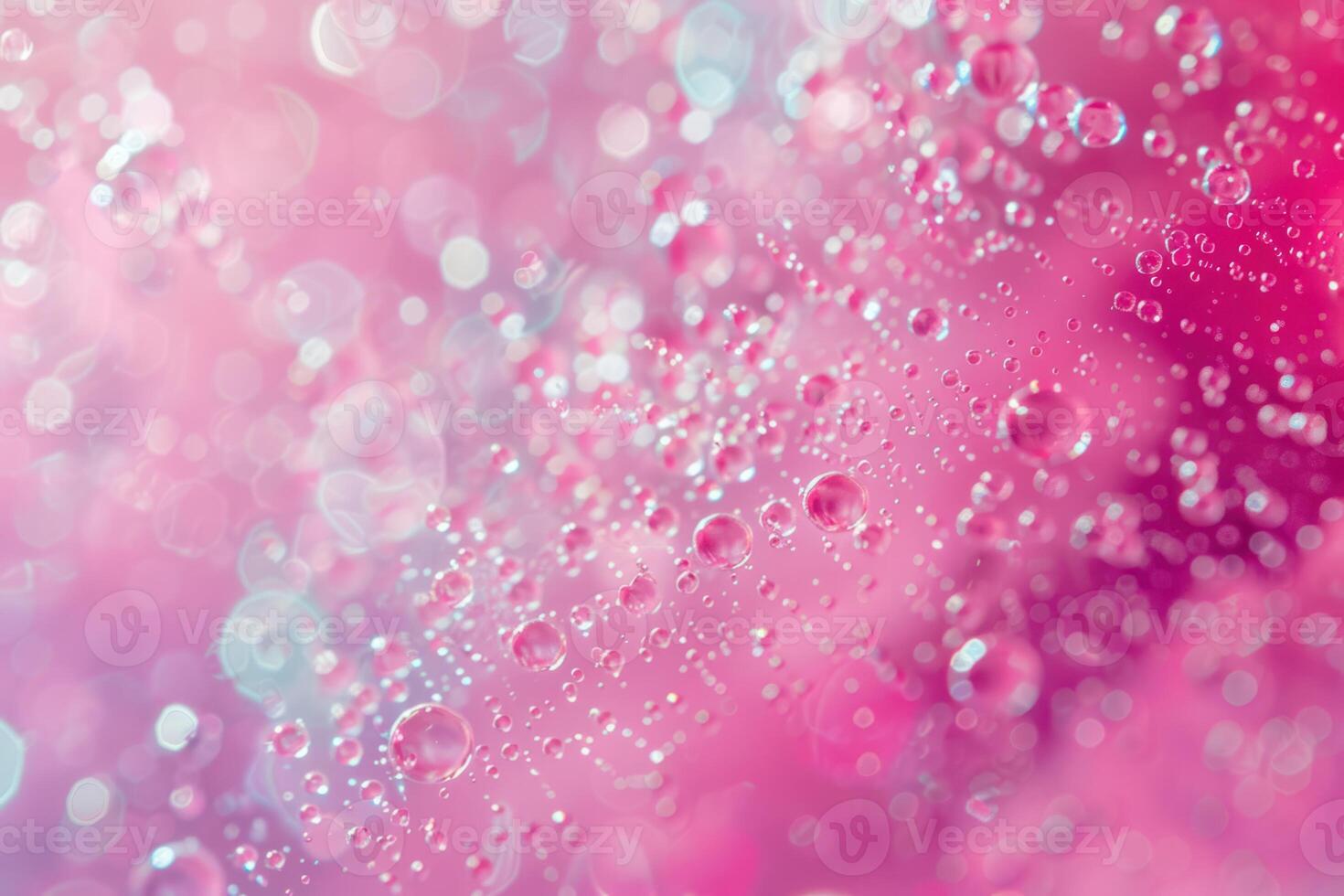 Water droplets on a pink background photo