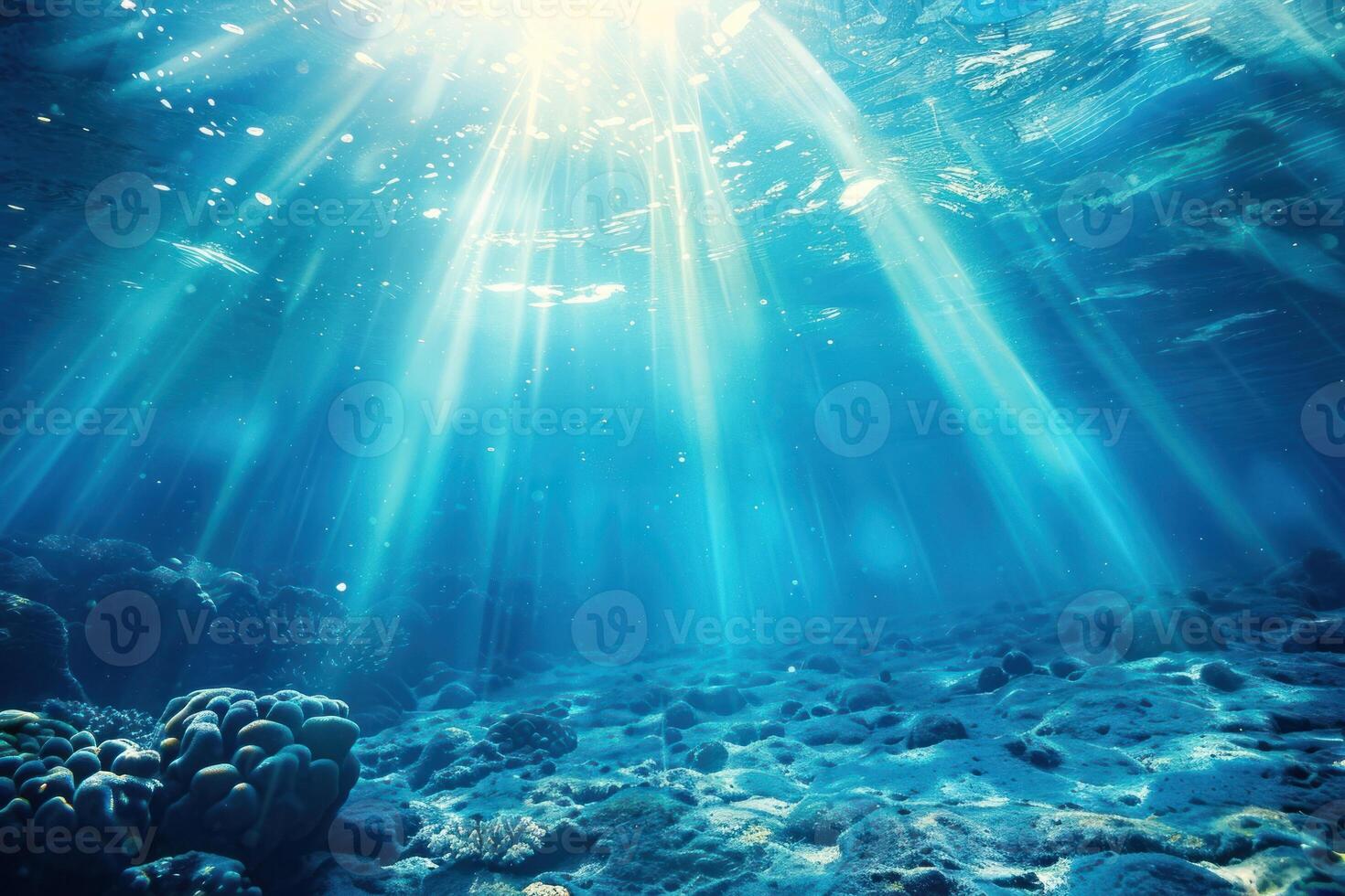 Underwater scene with sunbeams shining through the water photo