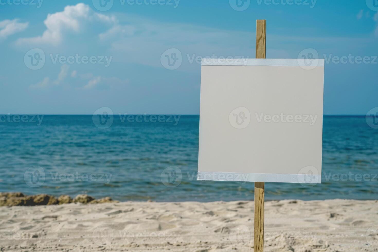 Blank sign on the beach photo