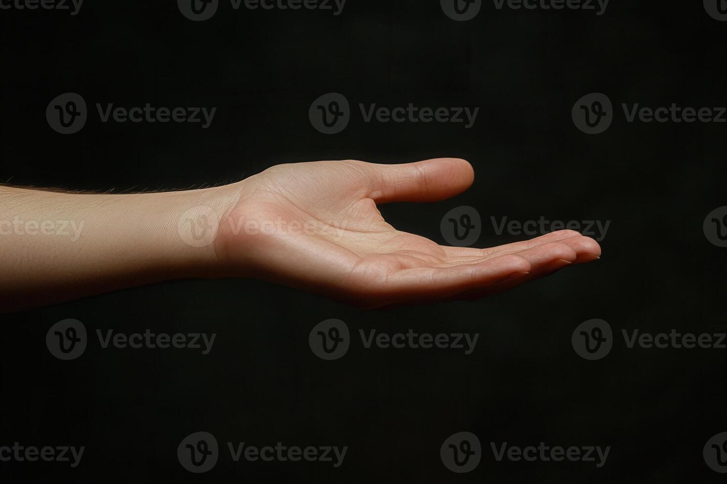 A hand reaching out to the sky photo