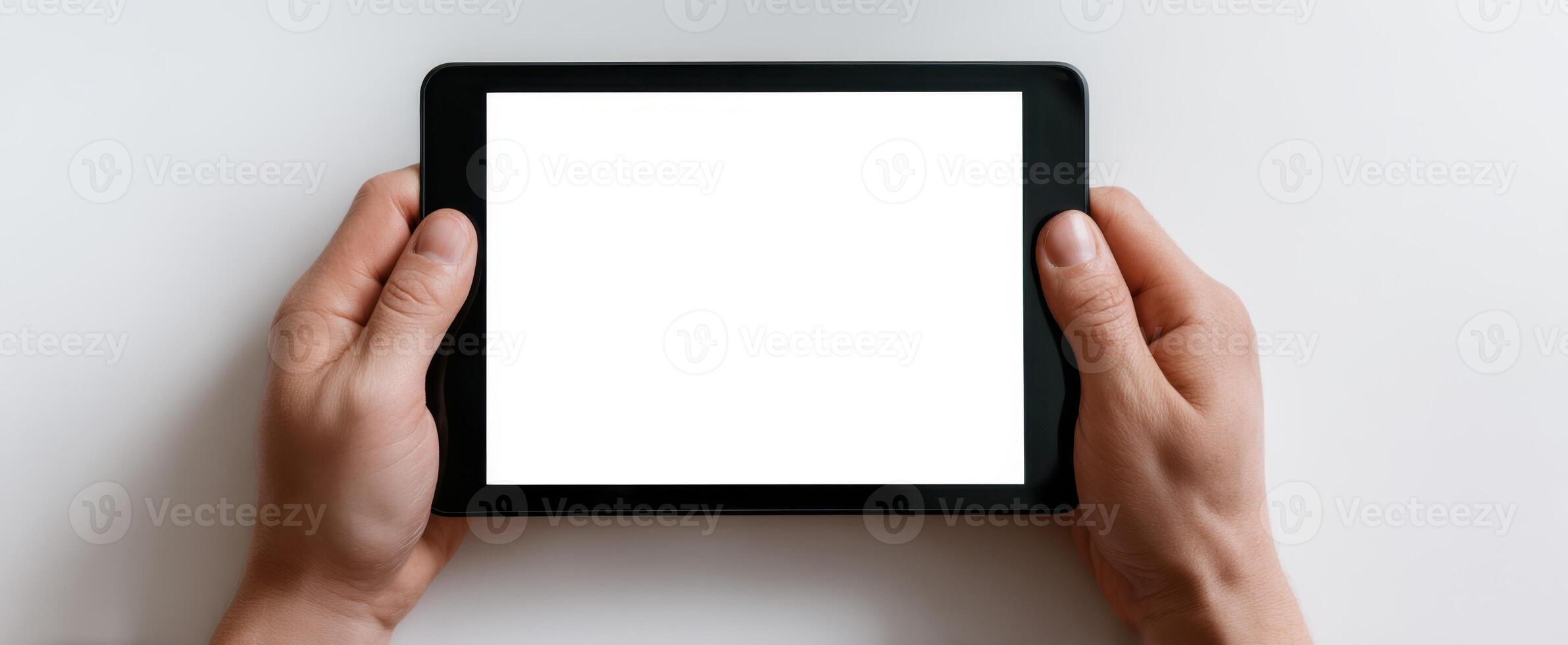 The tablet in hands ready for creative digital content display. photo