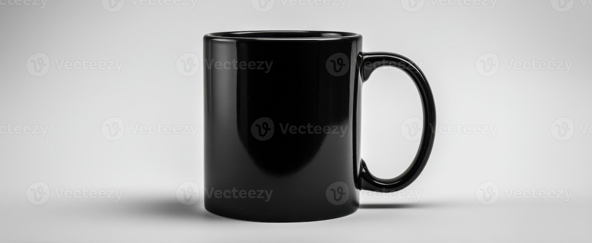 The sleek black mug showcasing modern minimalism and elegance. photo