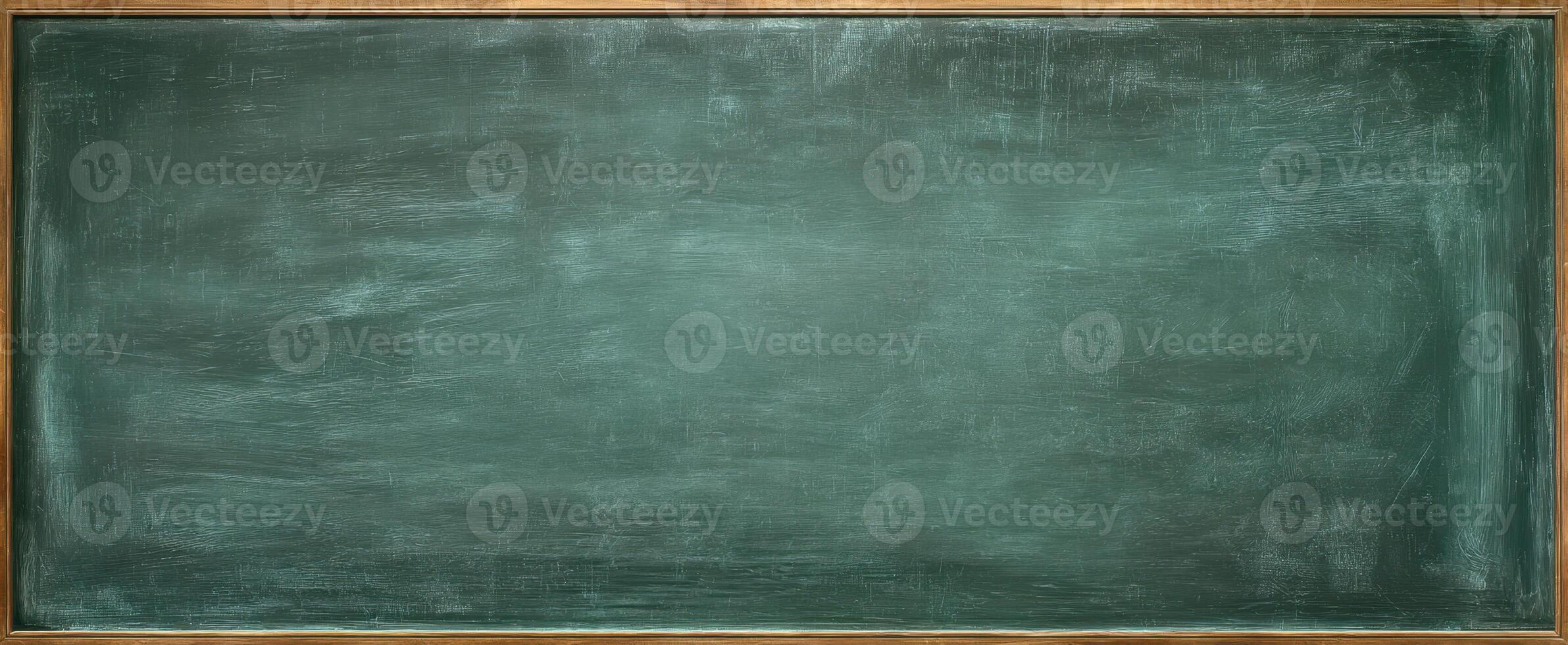 The empty chalkboard waiting for creative expression and educational insights. photo