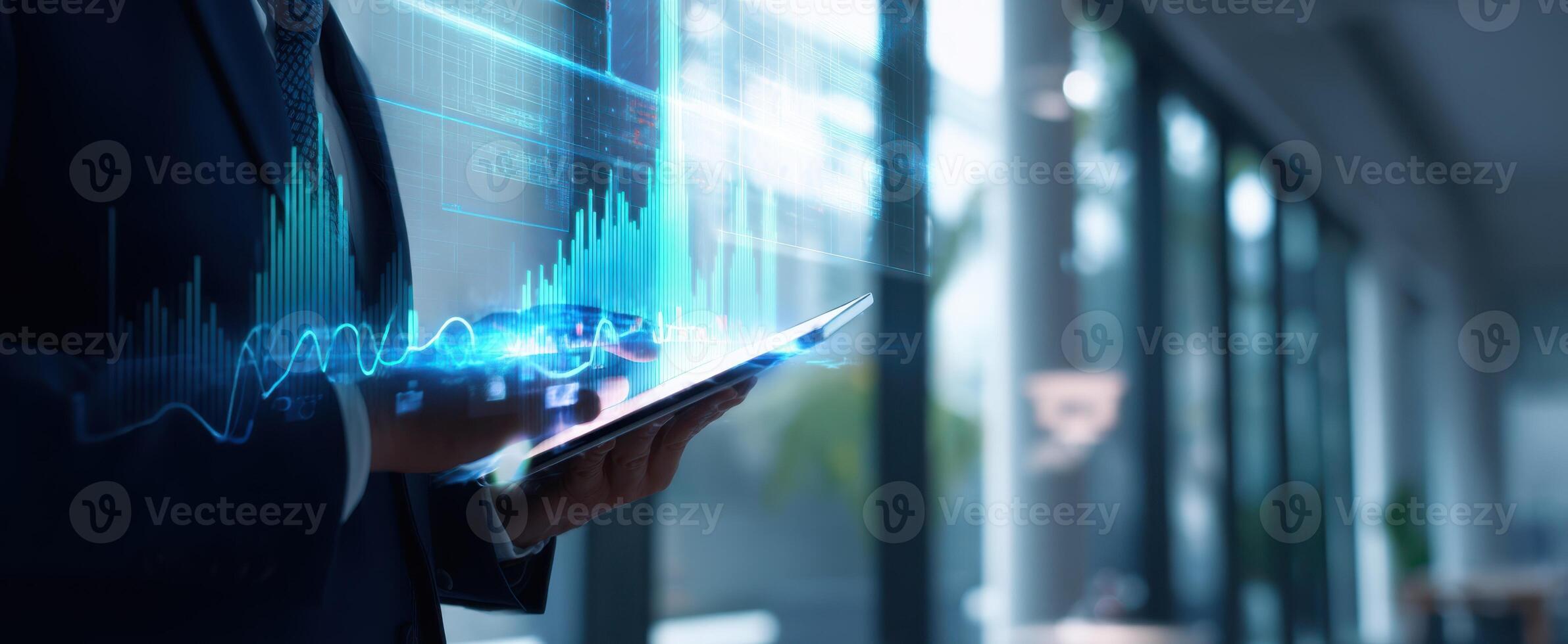 The business professional interacting with digital data visualization on a tablet. photo