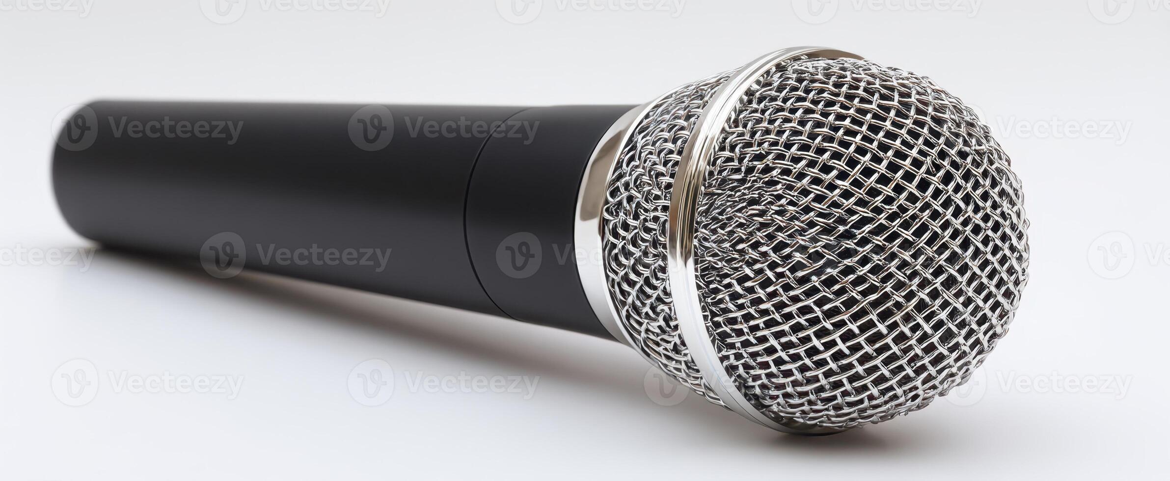 The microphone resting elegantly on a clean, white surface. photo