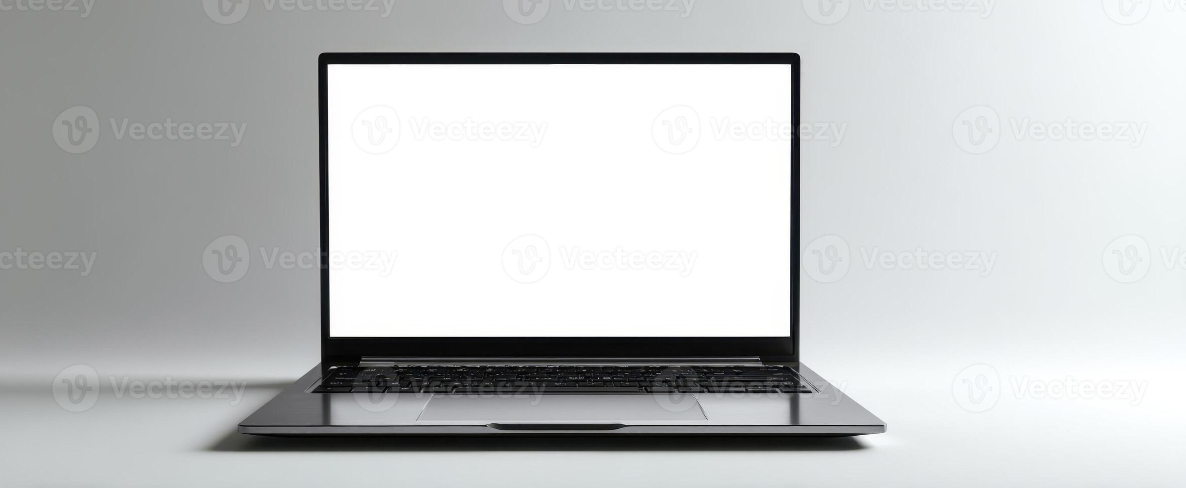 The sleek laptop with a blank screen for creative digital design. photo