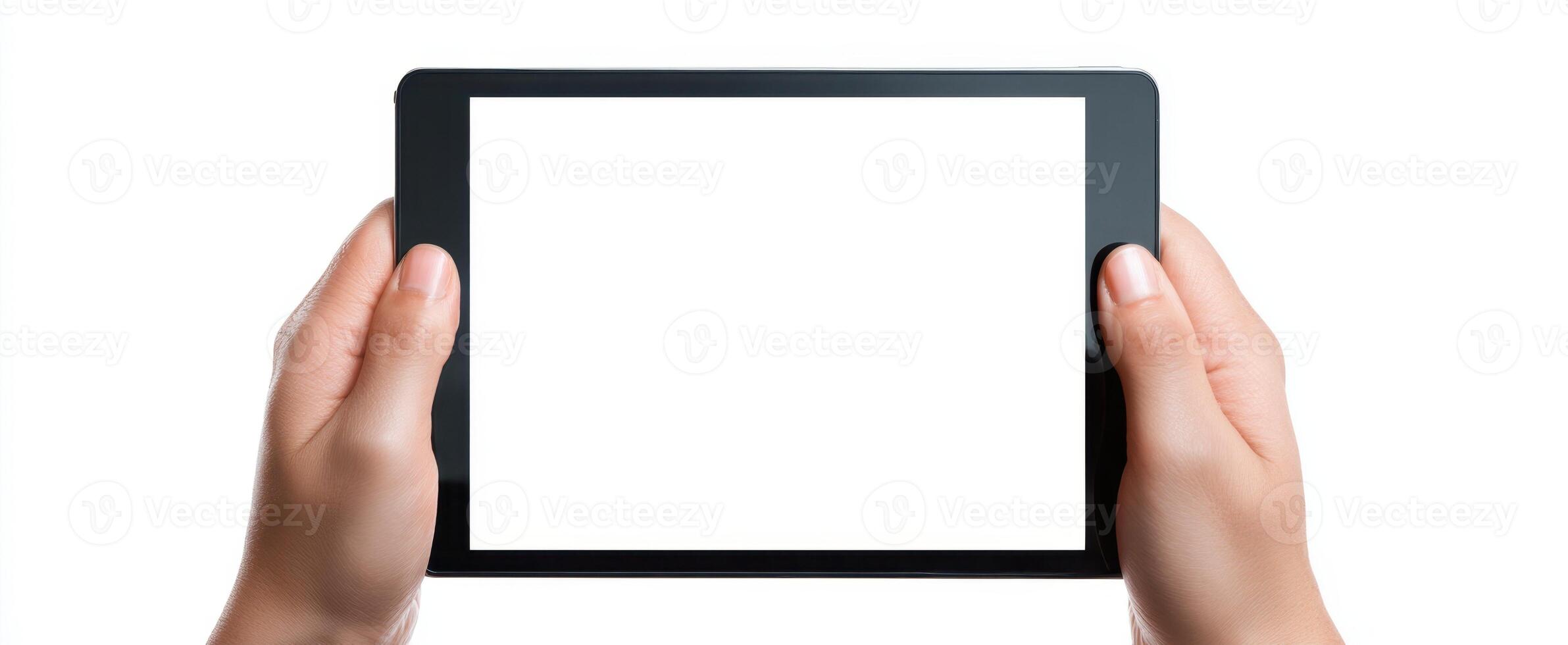 The hands holding a tablet displaying a blank screen for creative projects. photo