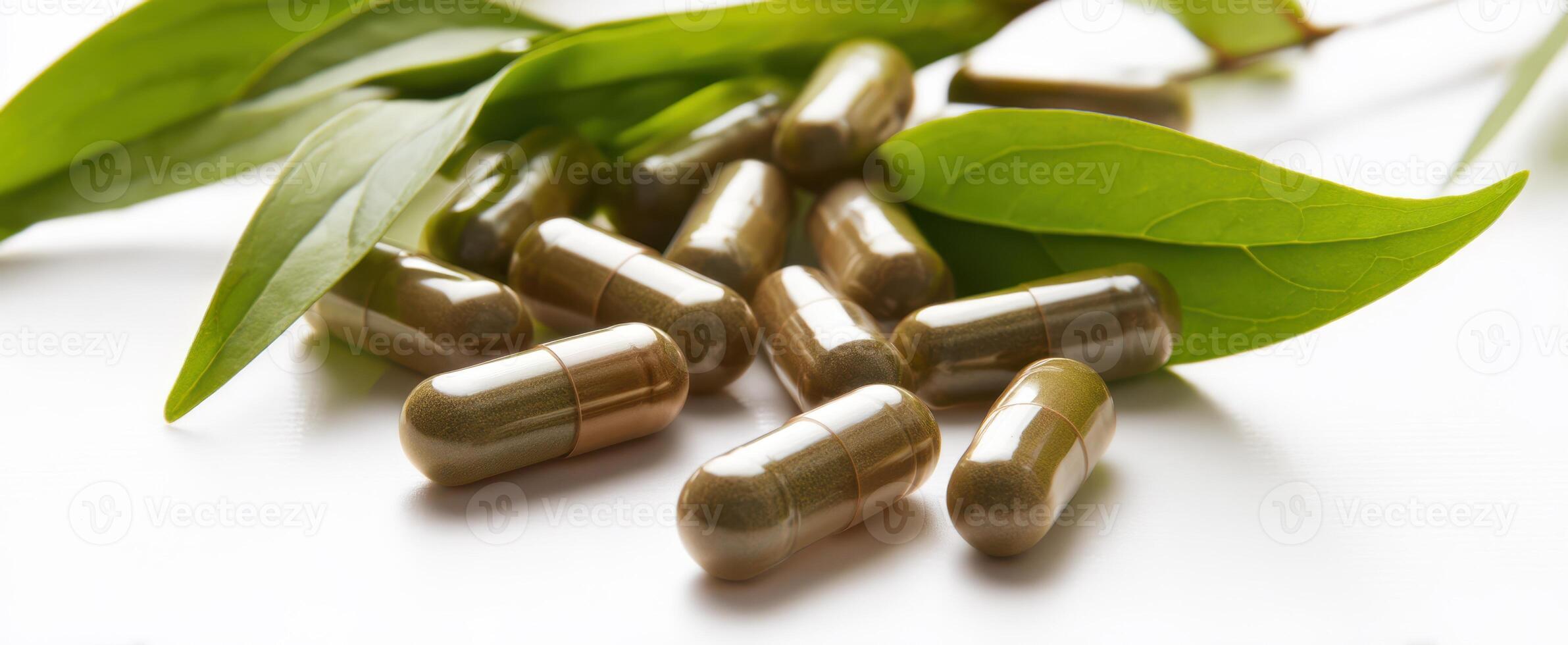 The capsules surrounded by fresh green leaves on a white background. photo