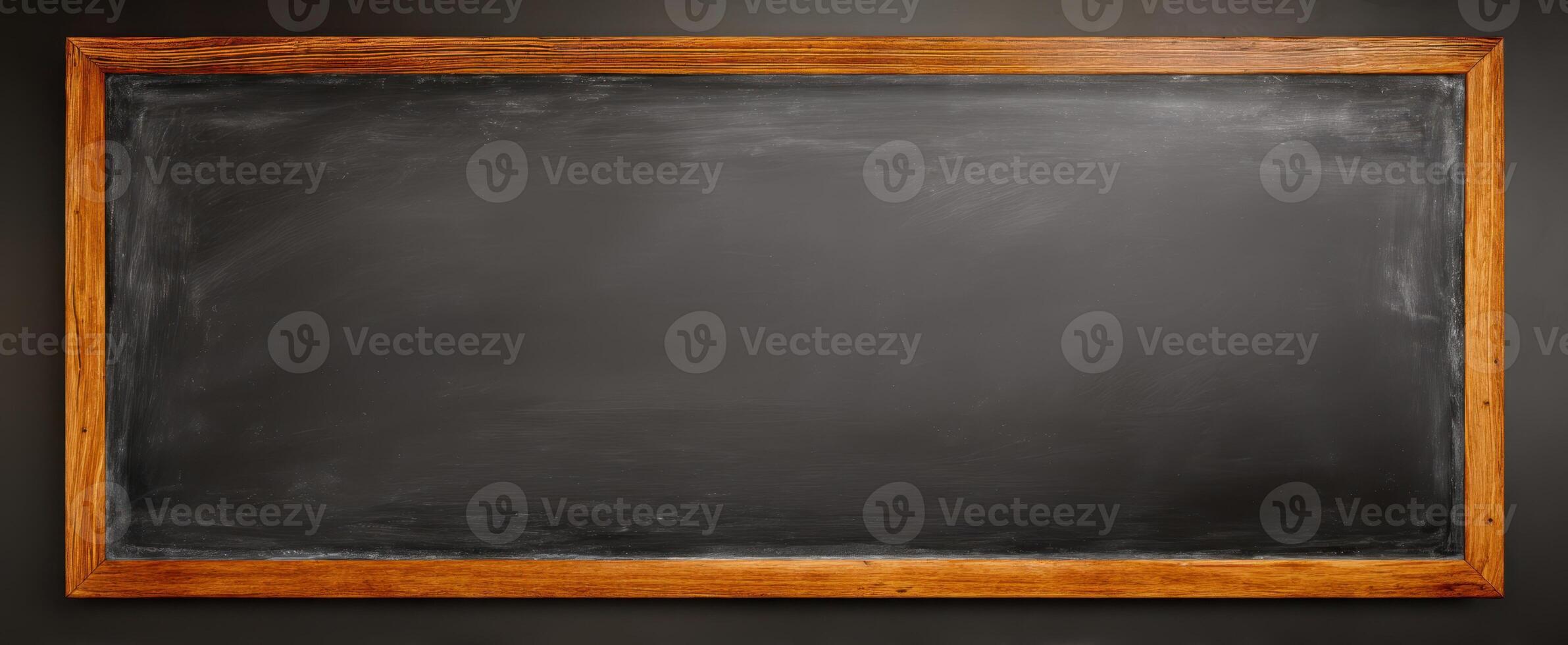 The blank chalkboard ready for creative teaching and learning moments. photo