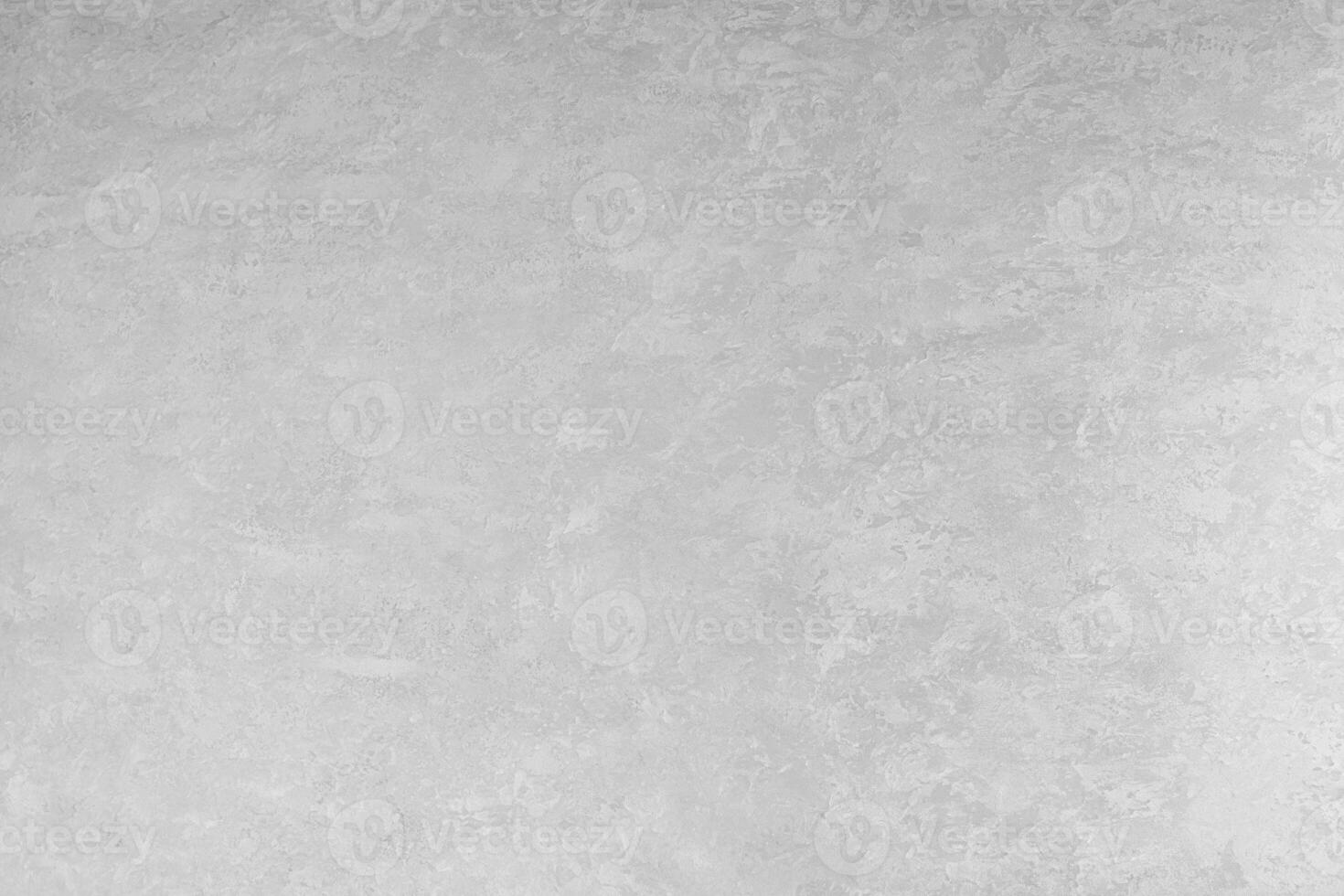 Modern stucco textured wall in light gray color creating an abstract background for design projects and interior decoration concept for walls and backdrop photo