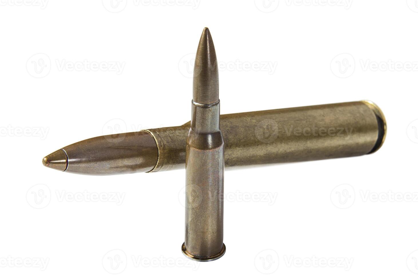 Rifle cartridges with copper bullets on white background photo