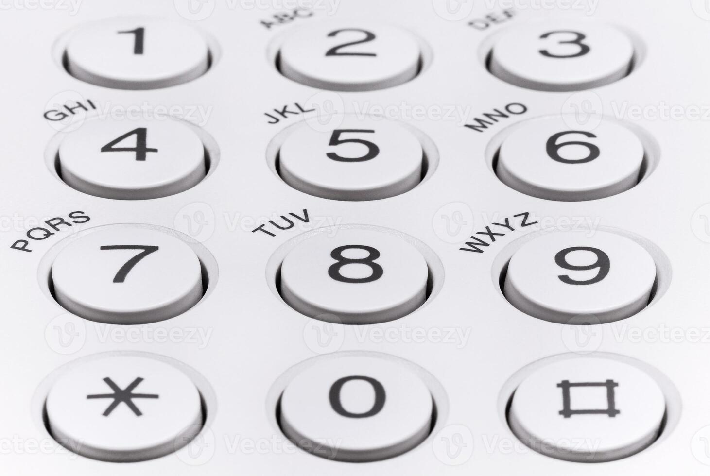 Round plastic buttons with numbers on office equipment photo