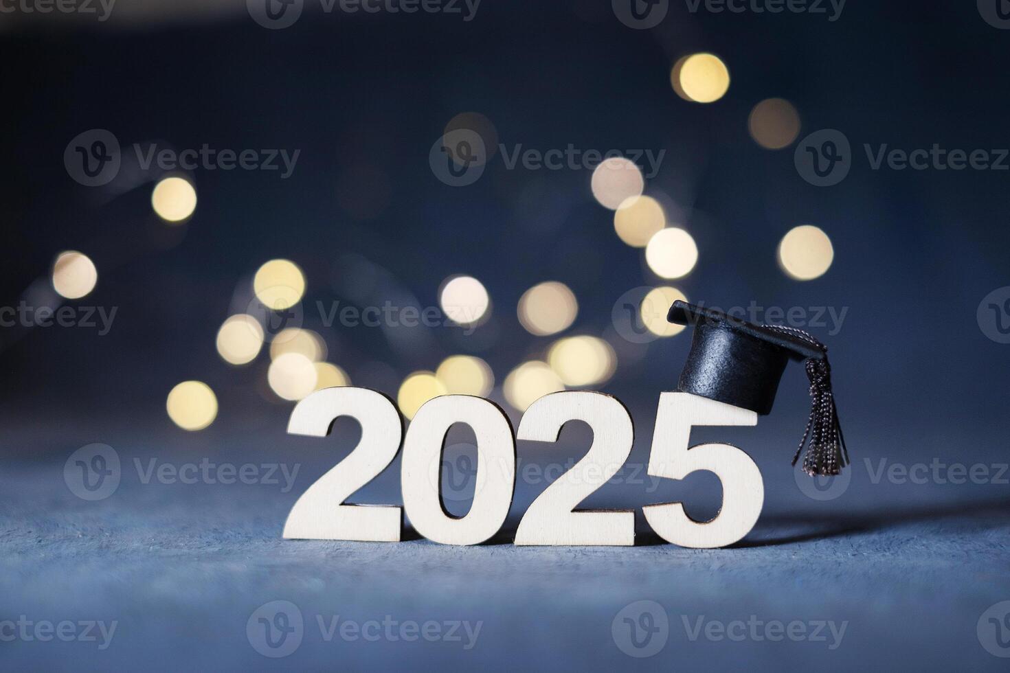 Class of 2025 concept. Wooden number 2025 with graduate hat photo