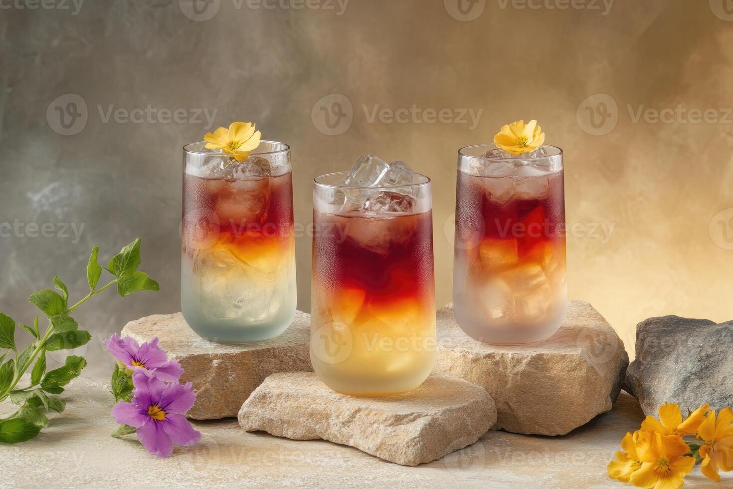 Sipping tea cocktails in elegant glasses with flowers on textured stone slabs in soft tones photo