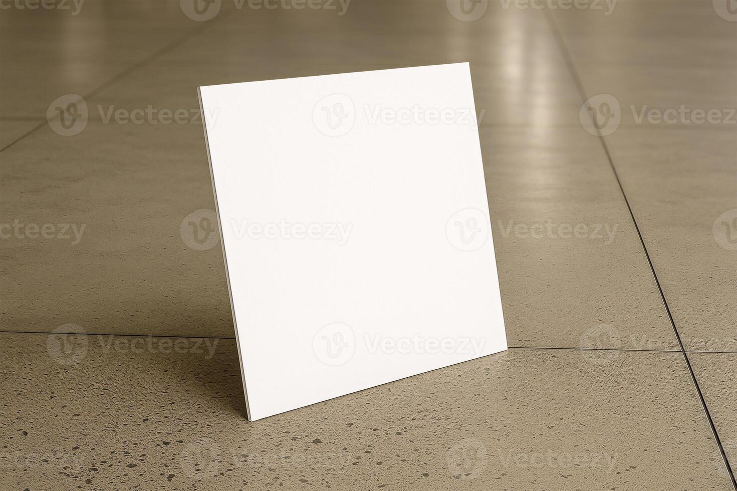 white square plate on the floor of an empty area photo