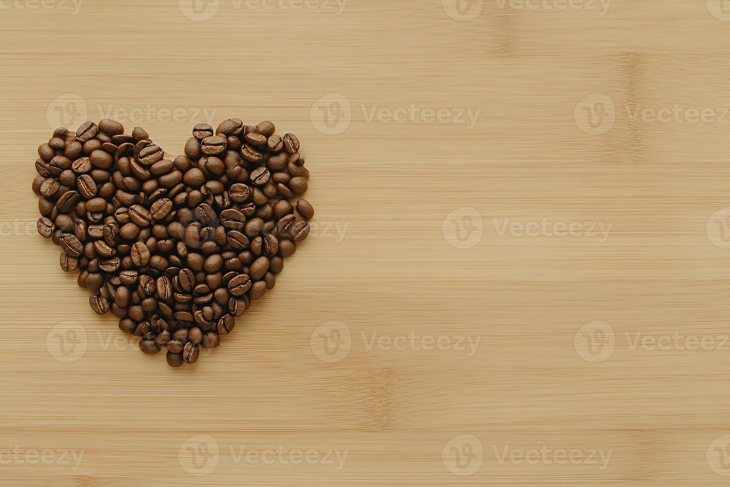 Flat lay photo of freshly roasted coffee beans forming heart on natural wooden rustic table with copy space. image for use in cafe menus or websites dedicated to coffee culture and love