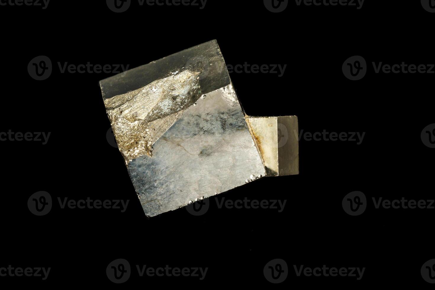 Macro mineral, stone Pyrite on a black background photo