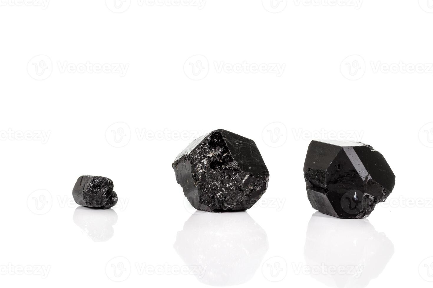 macro mineral, stone schorl, black tourmaline on white background photo