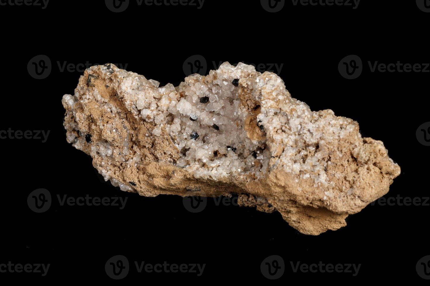 Macro stone Apophyllite mineral with ilvaite on a black background photo