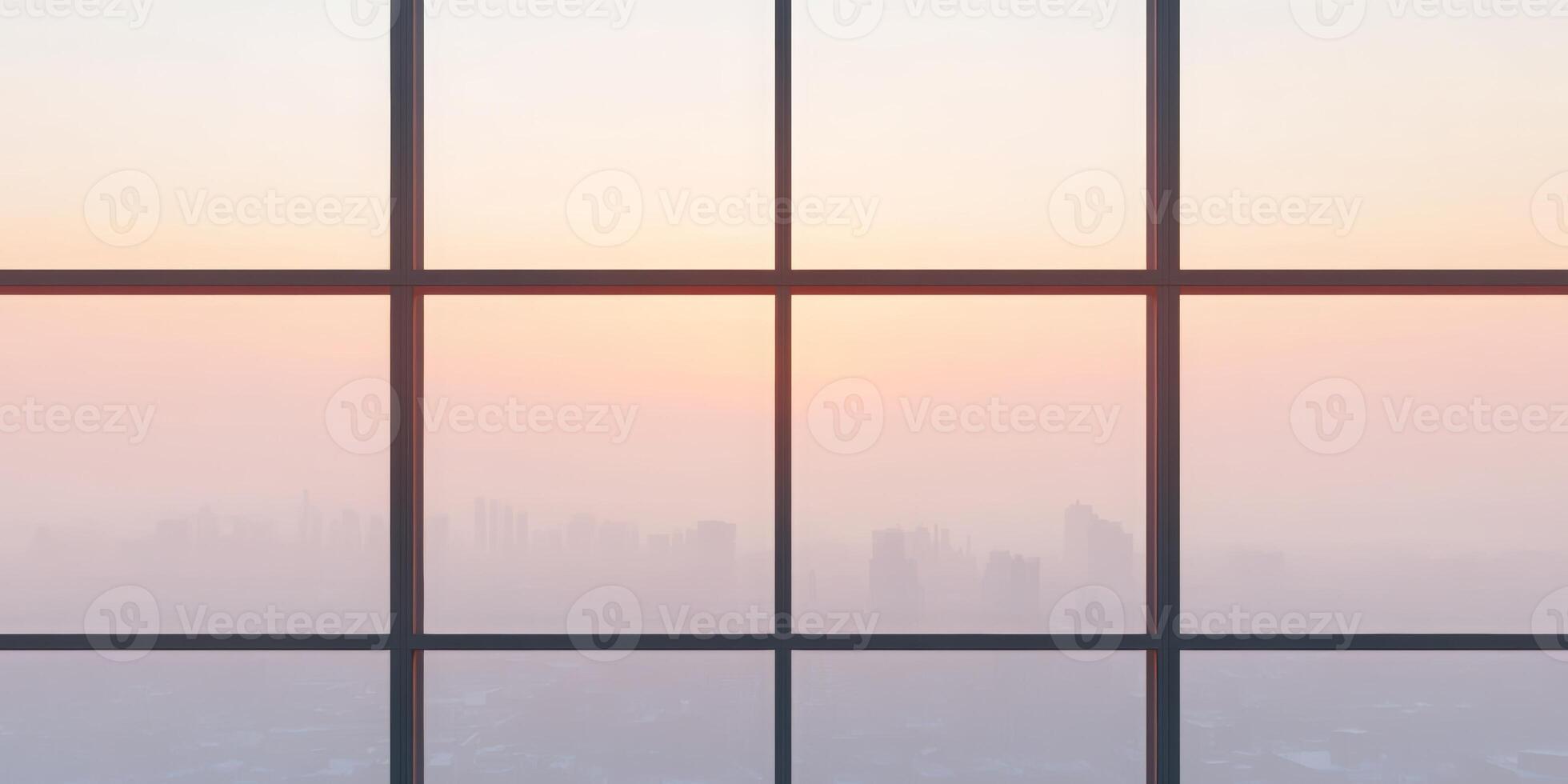 City skyline at sunrise through large glass window with soft hues photo