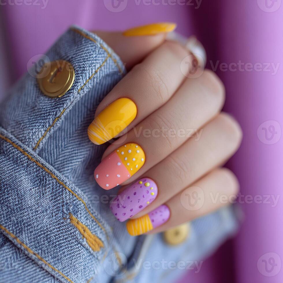 Woman showing colorful nails with pop style manicure photo