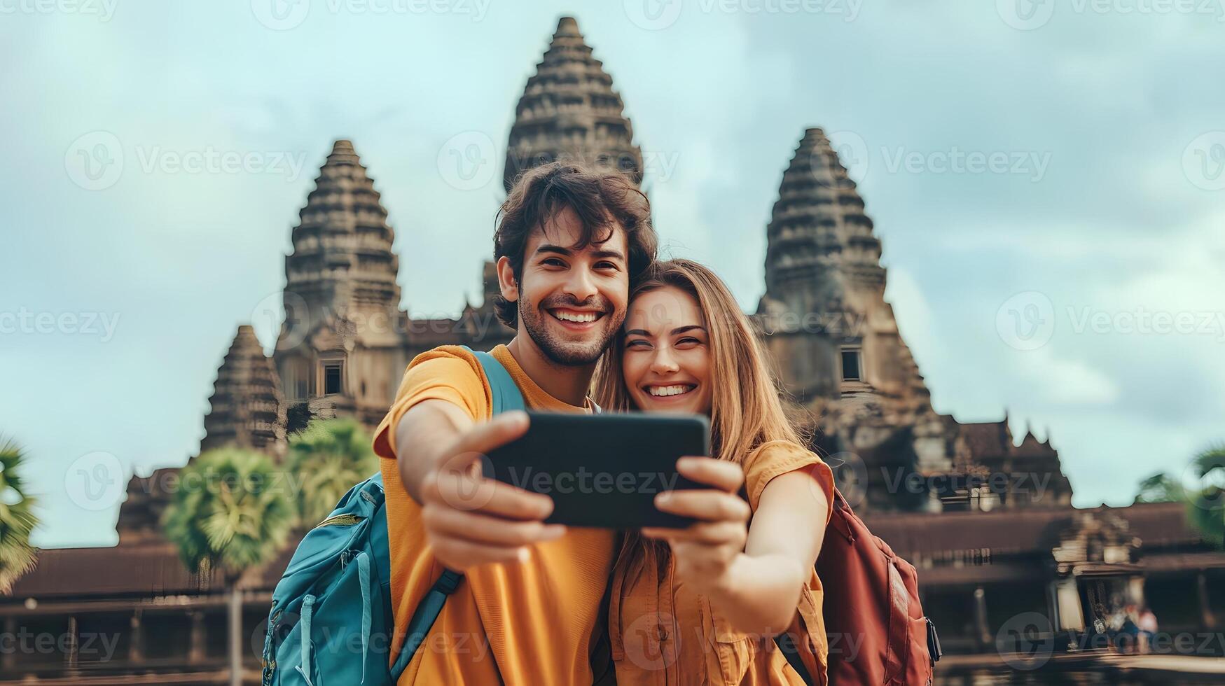 Traveling couple taking photos in front of historical landmarks