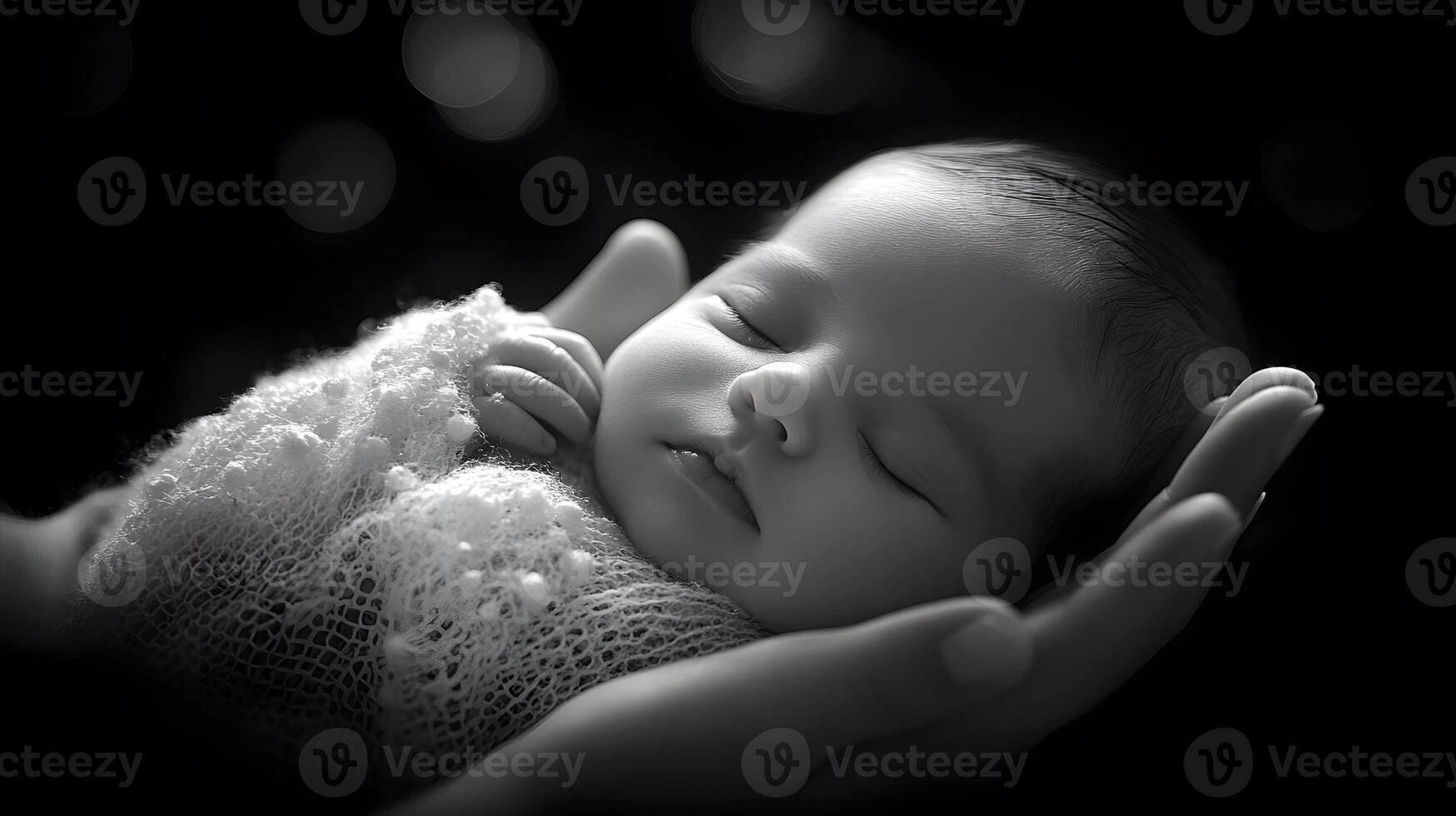 mother holding newborn baby with soft light photo