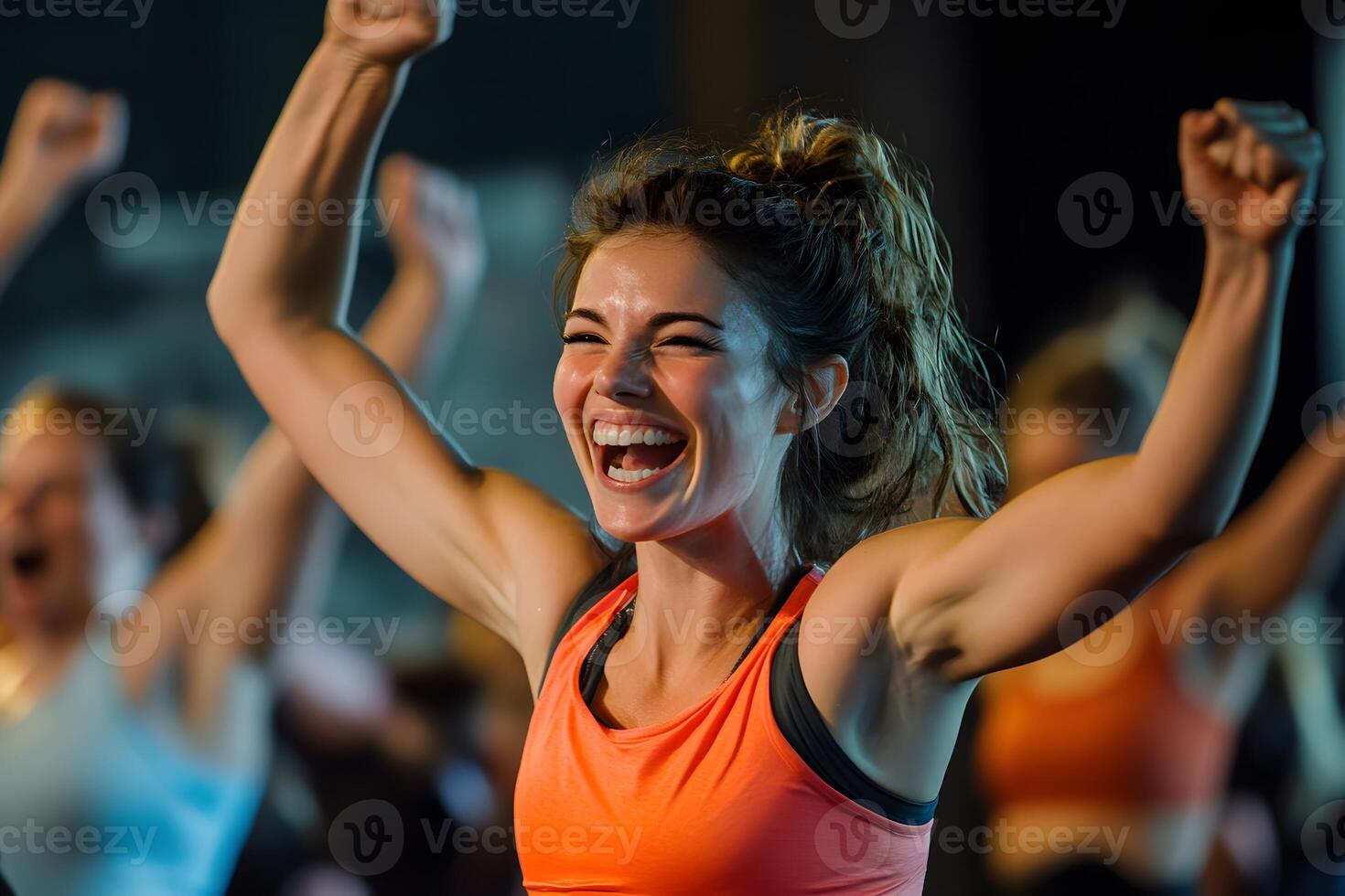group of people doing fitness exercises together, high-energy class photo