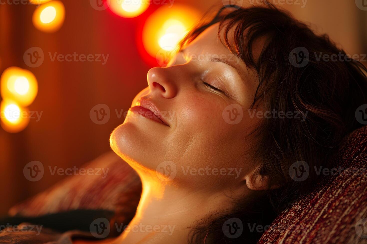 client experiencing emotional release during energy healing session warm lighting photo