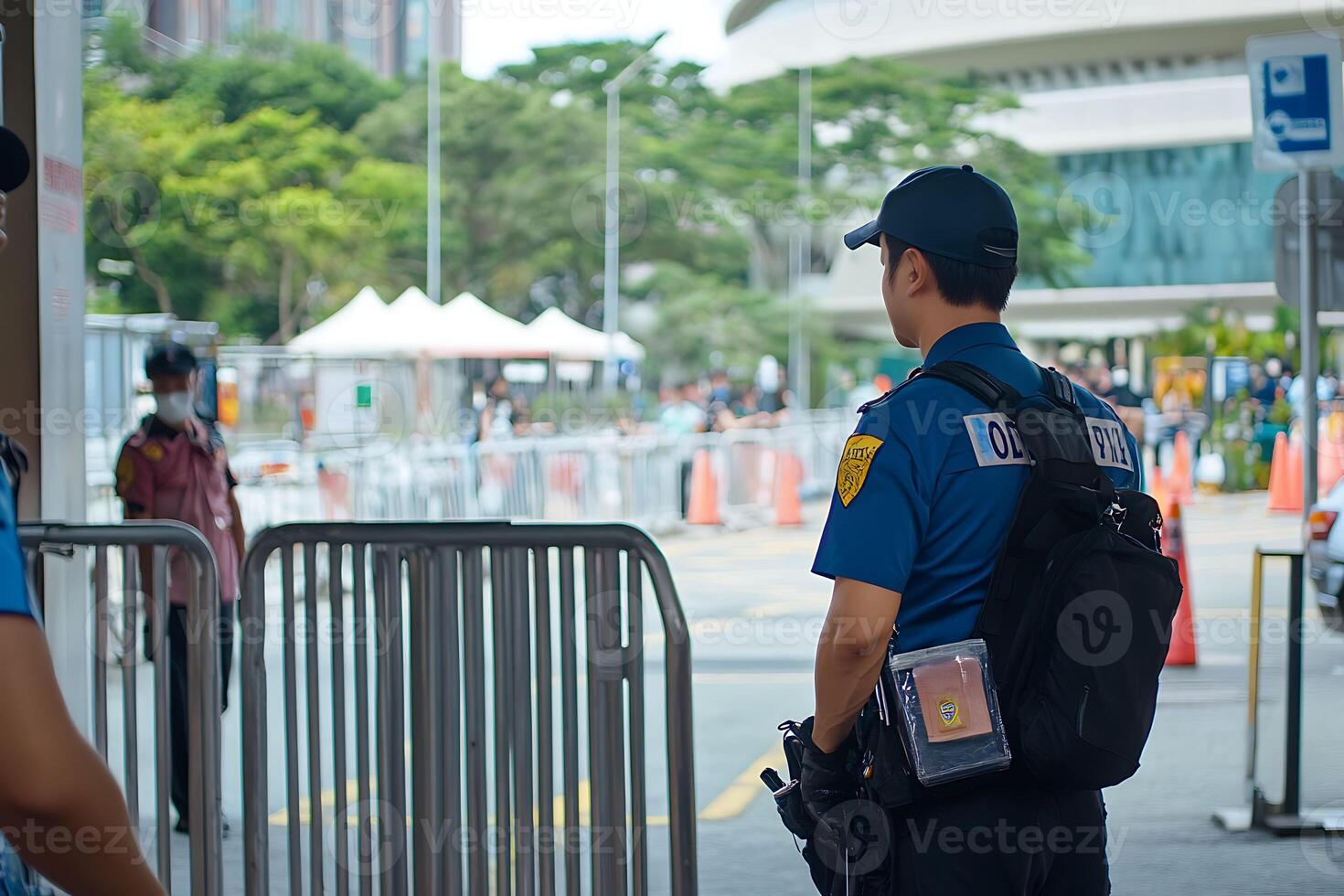 concert security checking bags at entry gate photo