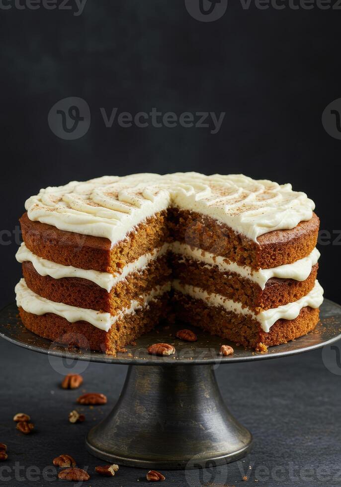 A beautifully decorated three-layer cake with a slice removed, ready to be served. photo