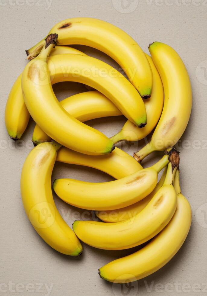 A collection of vibrant yellow bananas creating a delightful and nutritious arrangement. photo