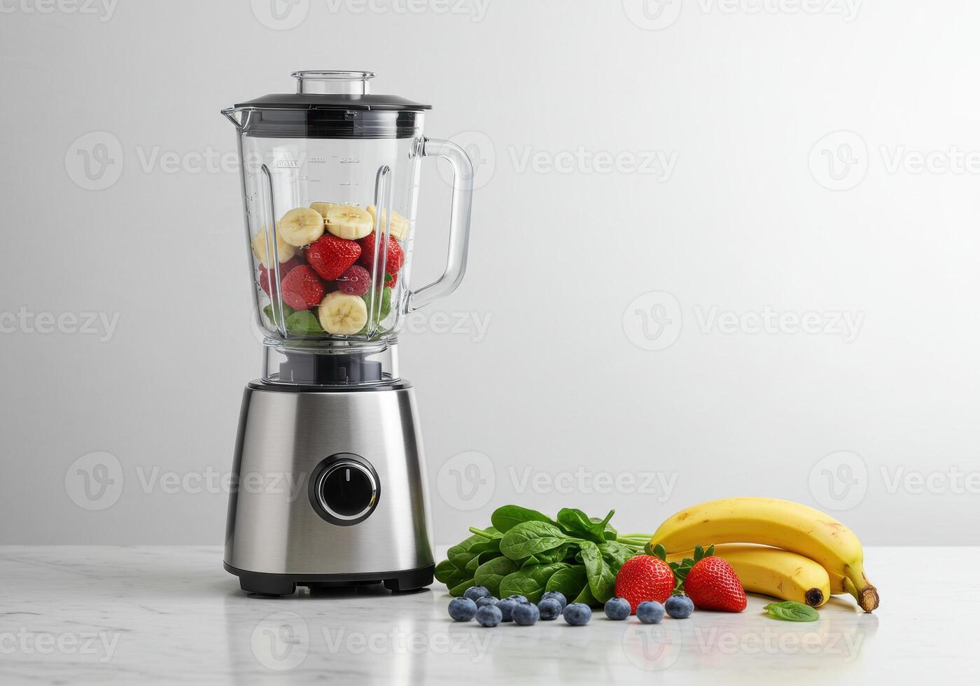 A modern blender with fresh fruits and ingredients, ready for a delicious smoothie. photo