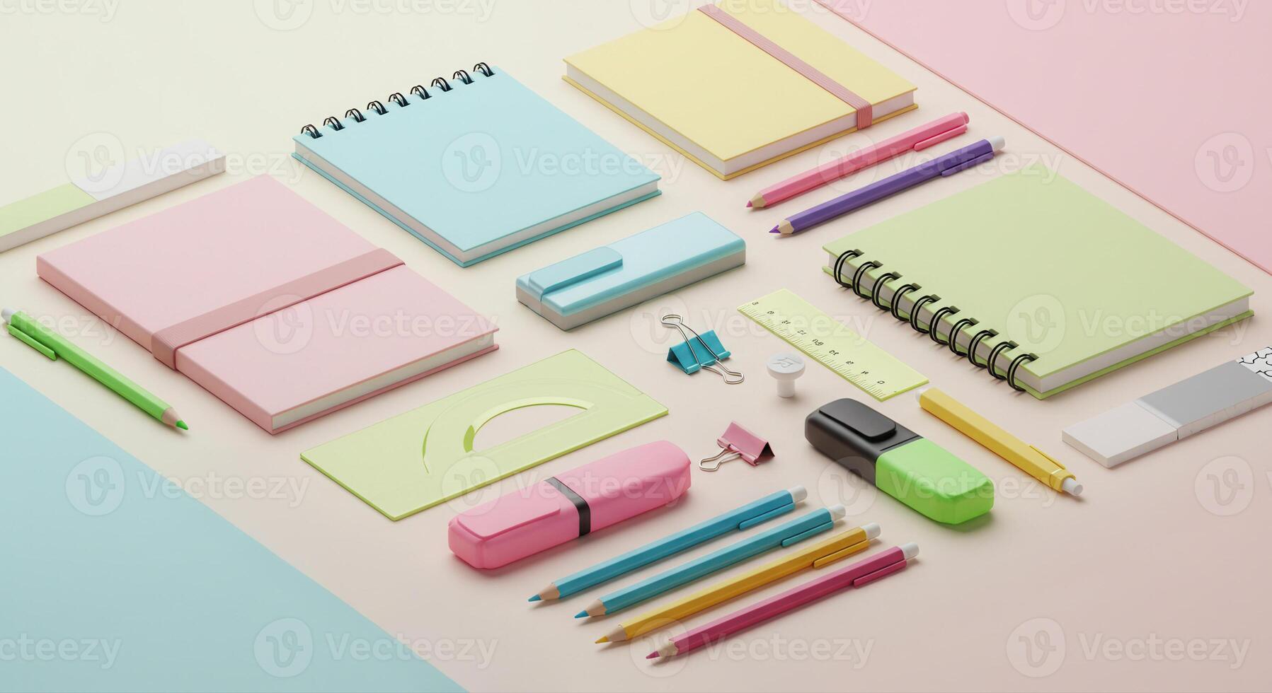 An organized collection of colorful stationery items arranged on a pastel-colored surface. photo