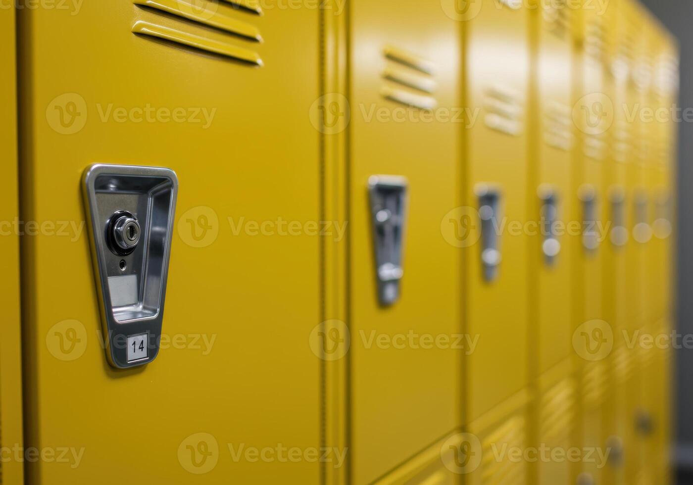 A close up shot of a row of vibrant yellow lockers, perfect for school or workplace use. photo