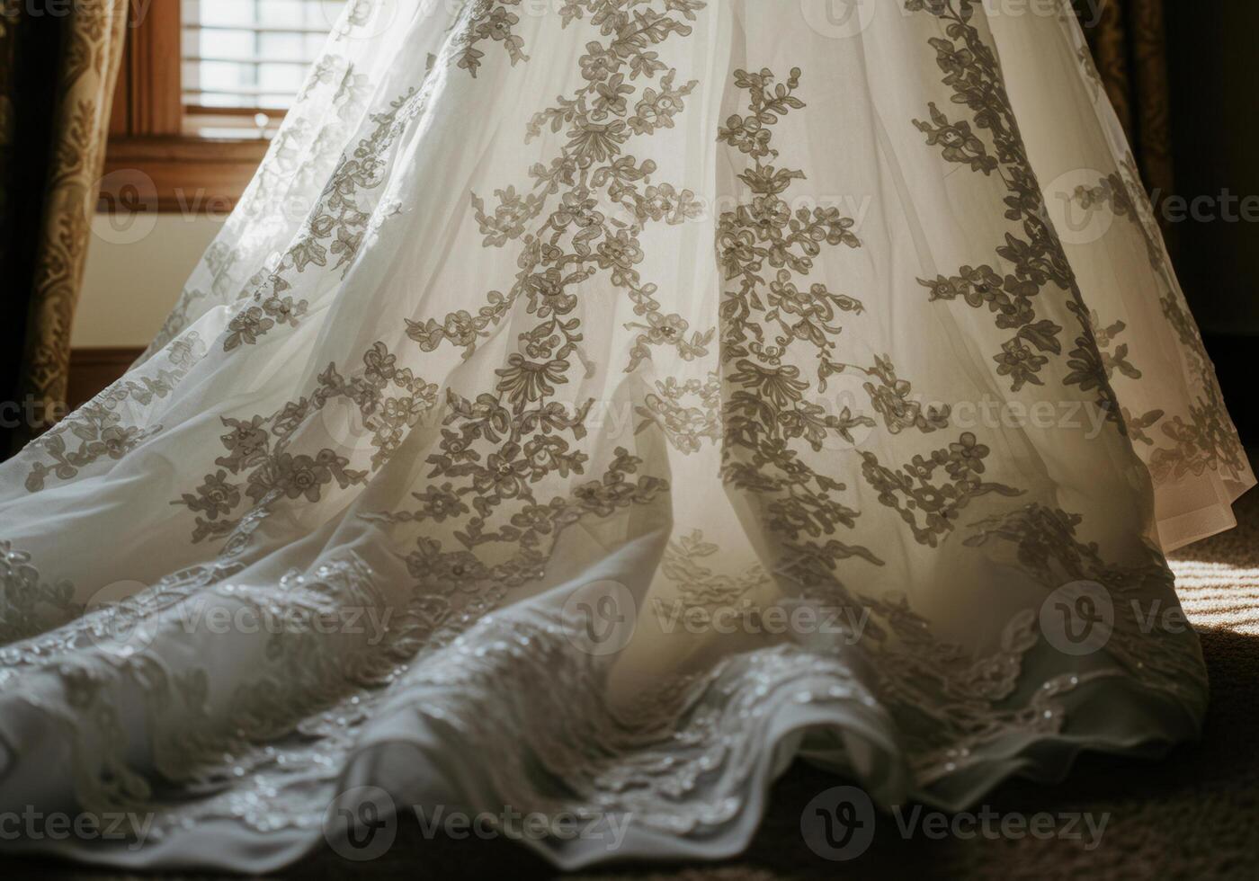 A stunning, detailed view of a white wedding dress with beautiful floral embroidery. photo
