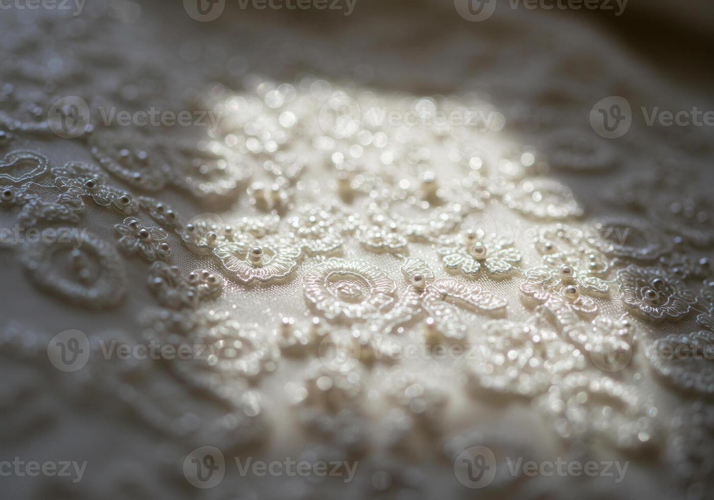Detailed view of a wedding dress with intricate floral embroidery and pearls. photo