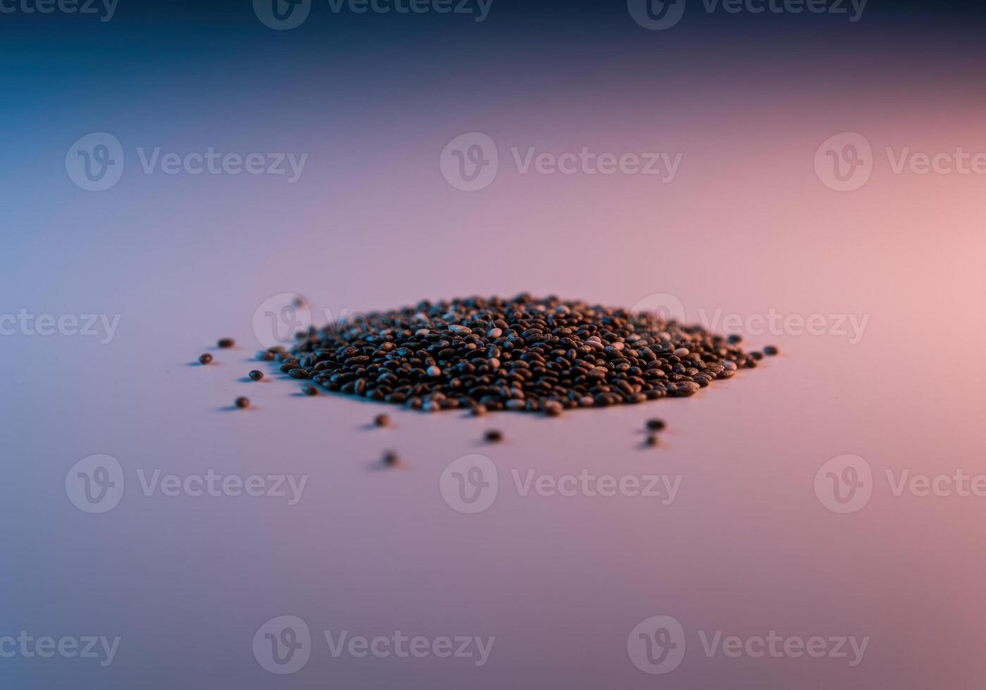 A close-up shot of a pile of chia seeds with beautiful lighting, perfect for health and wellness. photo