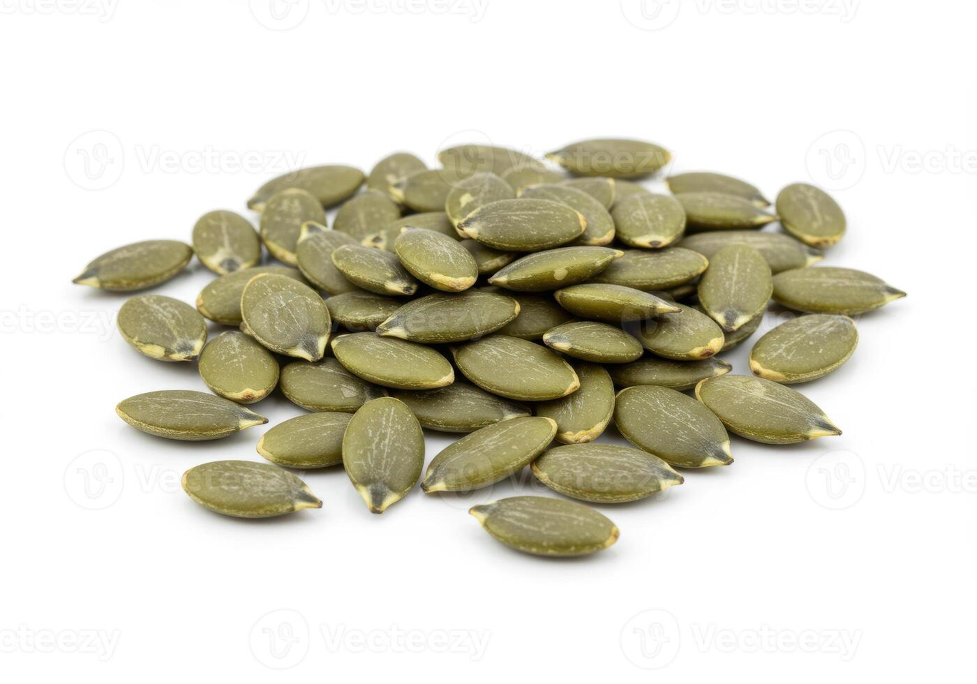 Close up view of a pile of pumpkin seeds isolated on a white background. photo