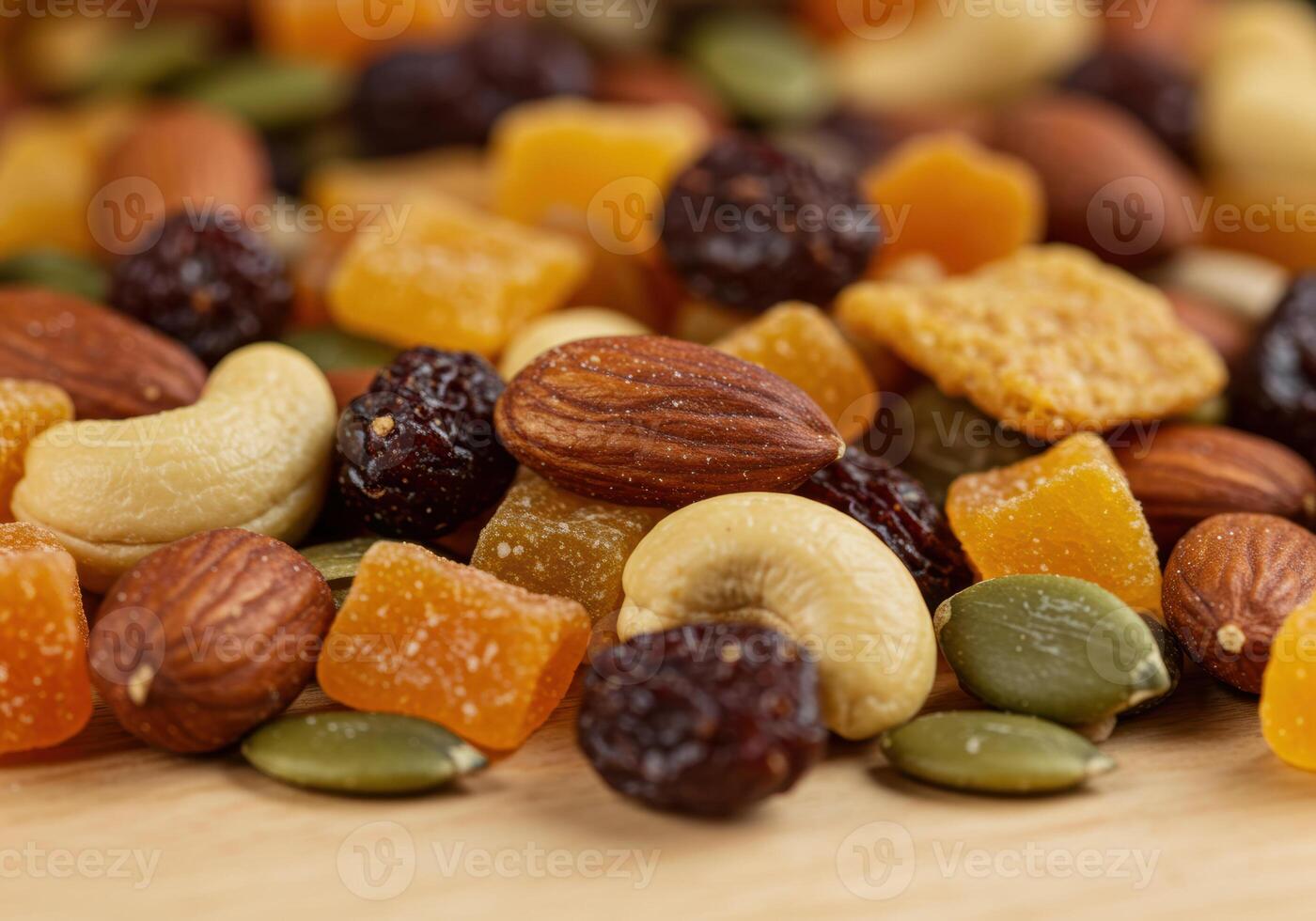 A colorful and appetizing mix of dried fruits and nuts, perfect for a quick and tasty snack. photo