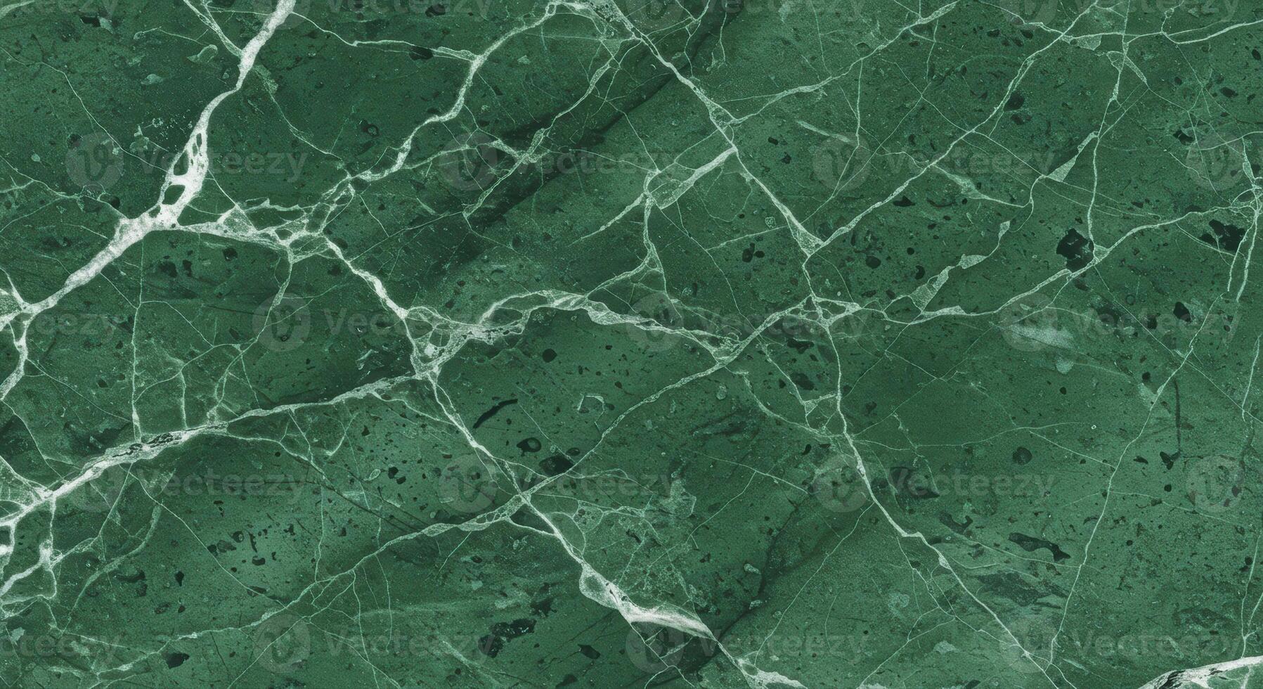 A close up image of elegant green marble stone with white veins running through. photo