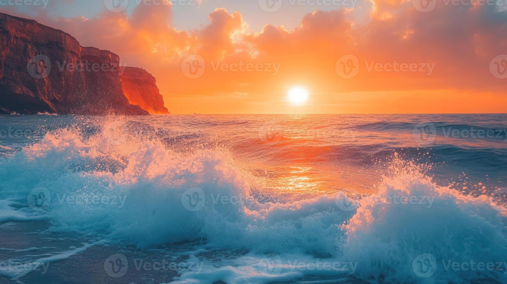 Ocean waves crashing against the shore under a vibrant sunset with cliffside view creating a stunning seascape scenery and golden light reflecting on the water surface photo