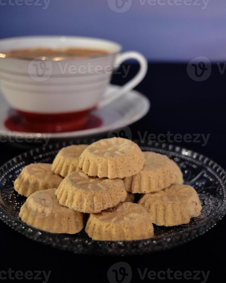 A plateful of delicious kue satu or kue koya, a popular dry traditional cookie commonly found in Java, made of sweet mung bean powder that crumbles when bitten. photo