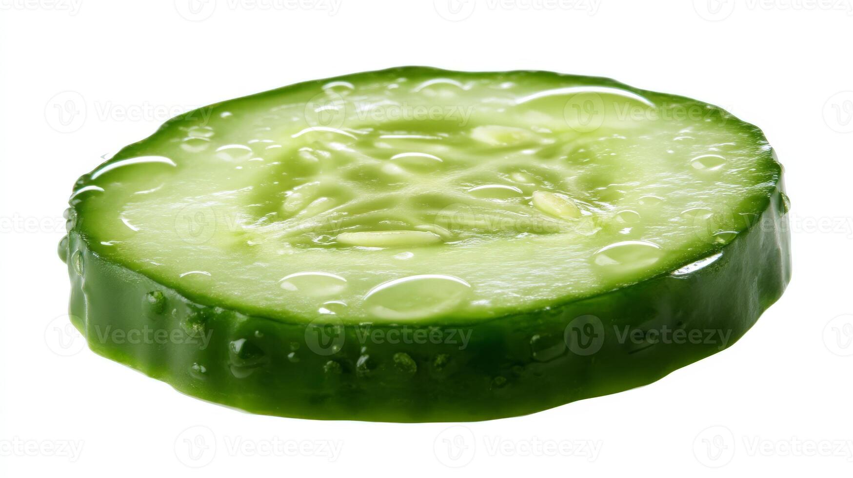 Closeup of a Fresh Green Cucumber Slice Isolated on White Background photo