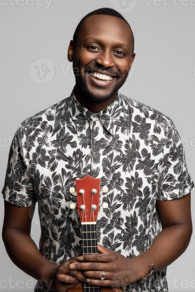 Smiling Black Man with Ukulele in Studio Portrait photo