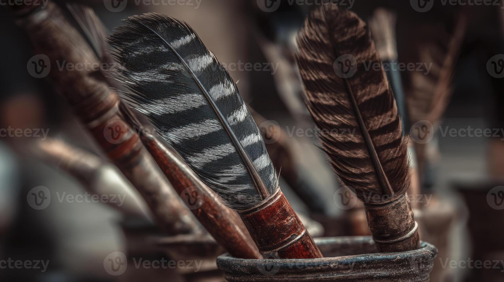 Dark Brown and Black Feather Art Brushes in Rustic Container photo