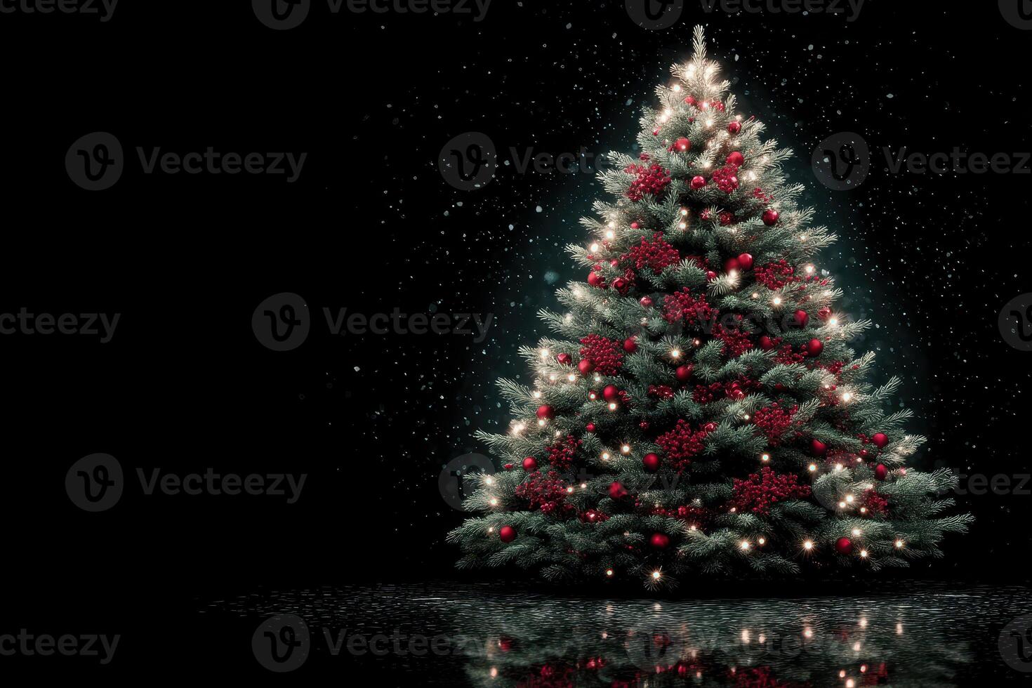Decorative Christmas tree with red ornaments and lights in a snowy backdrop creating a festive atmosphere for the holidays photo